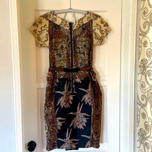 Anthropologie size 10 dress. Gorgeous fitted dress with structure and style.